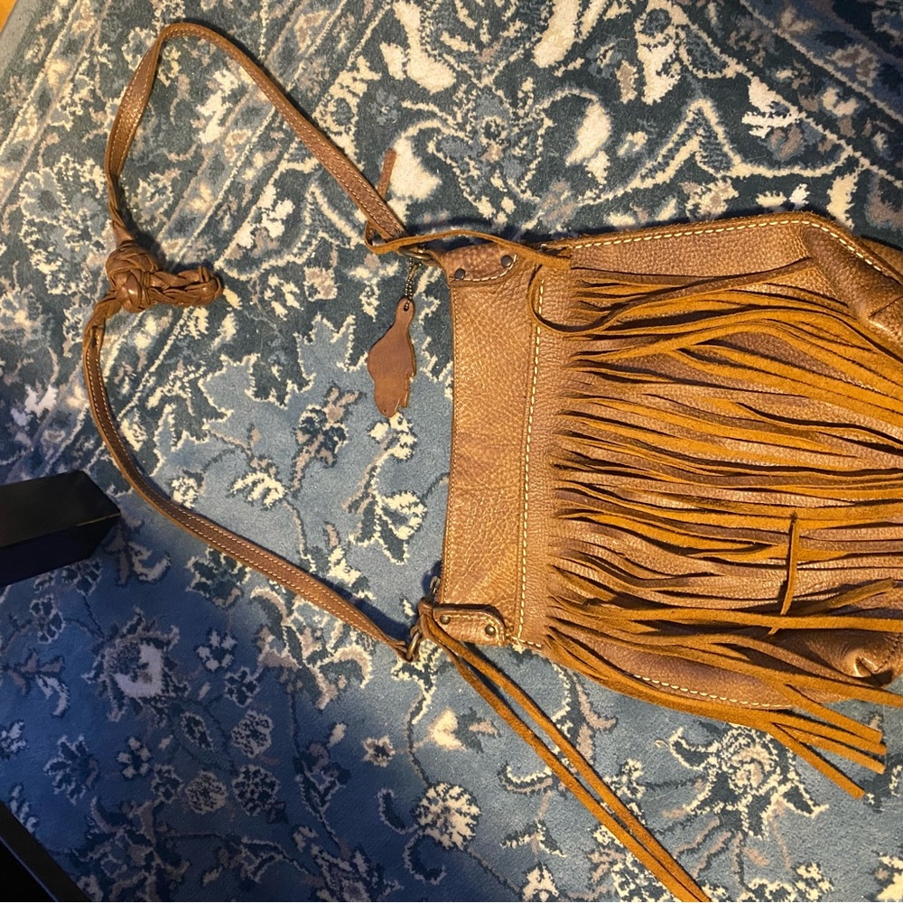 Roots leather purse